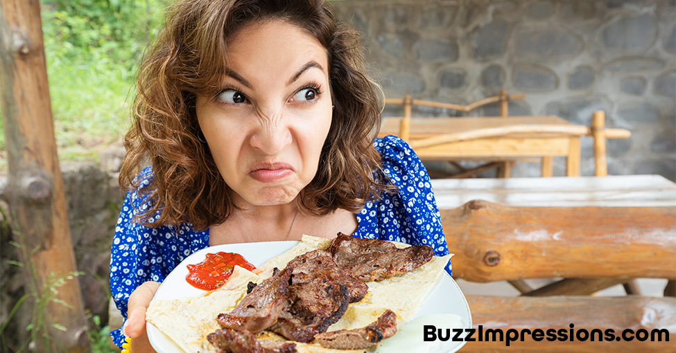 Woman Smelling Rotten Meat