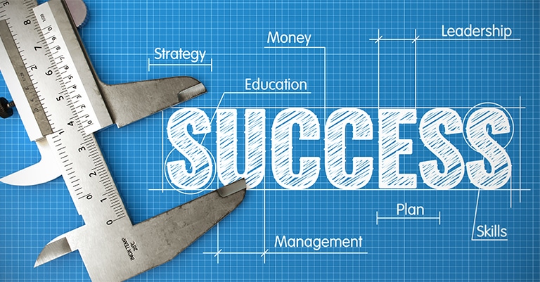 Caliper measuring the word "SUCCESS" on a blueprint background with labeled elements like leadership and strategy.